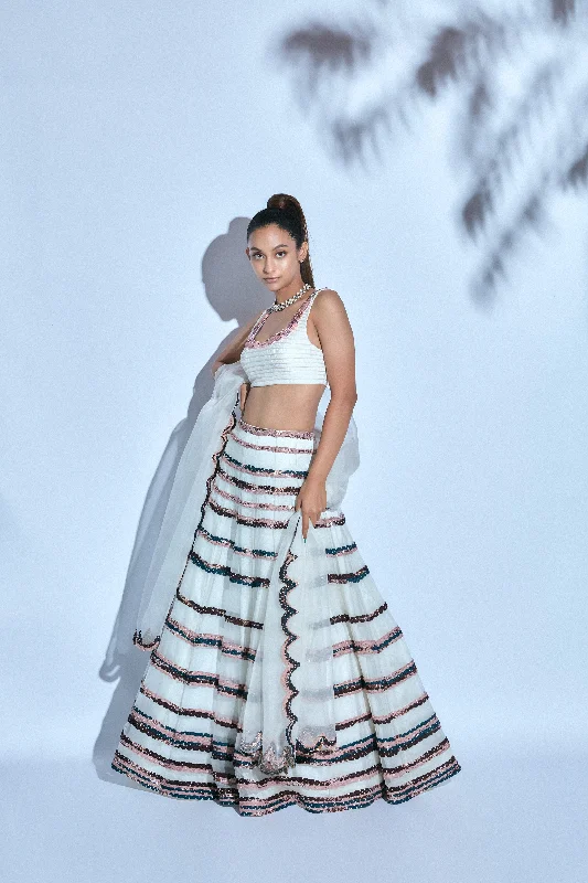 Hand-embroidered Corded White Blouse paired with Hand-embroidered Skirt and Organza Dupatta Backless Summer Blouse Hand-embroidered Corded White Blouse paired with Hand-embroidered Skirt and Organza Dupatta Backless Summer Blouse