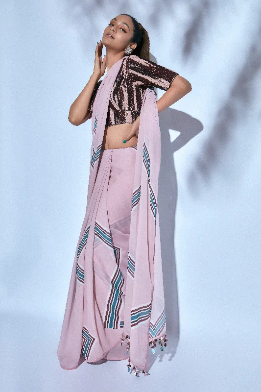 Printed Sari paired with Hand-embroidered Brown and Pink Blouse Textured Cotton Blouse Printed Sari paired with Hand-embroidered Brown and Pink Blouse Textured Cotton Blouse